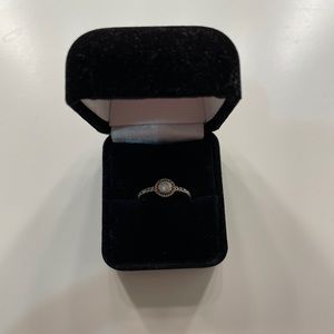 Rose gold round sparkle halo ring